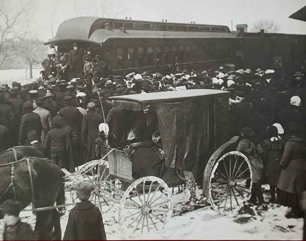 An Orphan Train stopped in a town