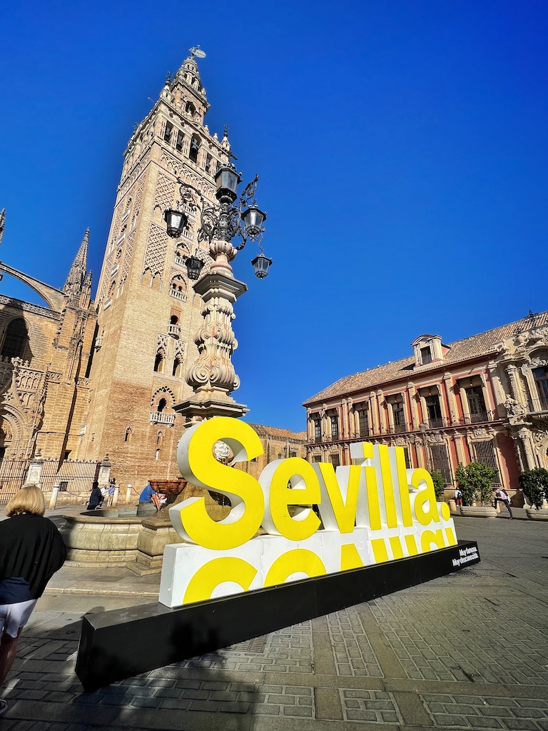 Seville, Spain sign in front of the cathedral